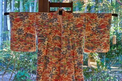Fine silk chirimen crepe kimono with classical floral motifs.  1970s
