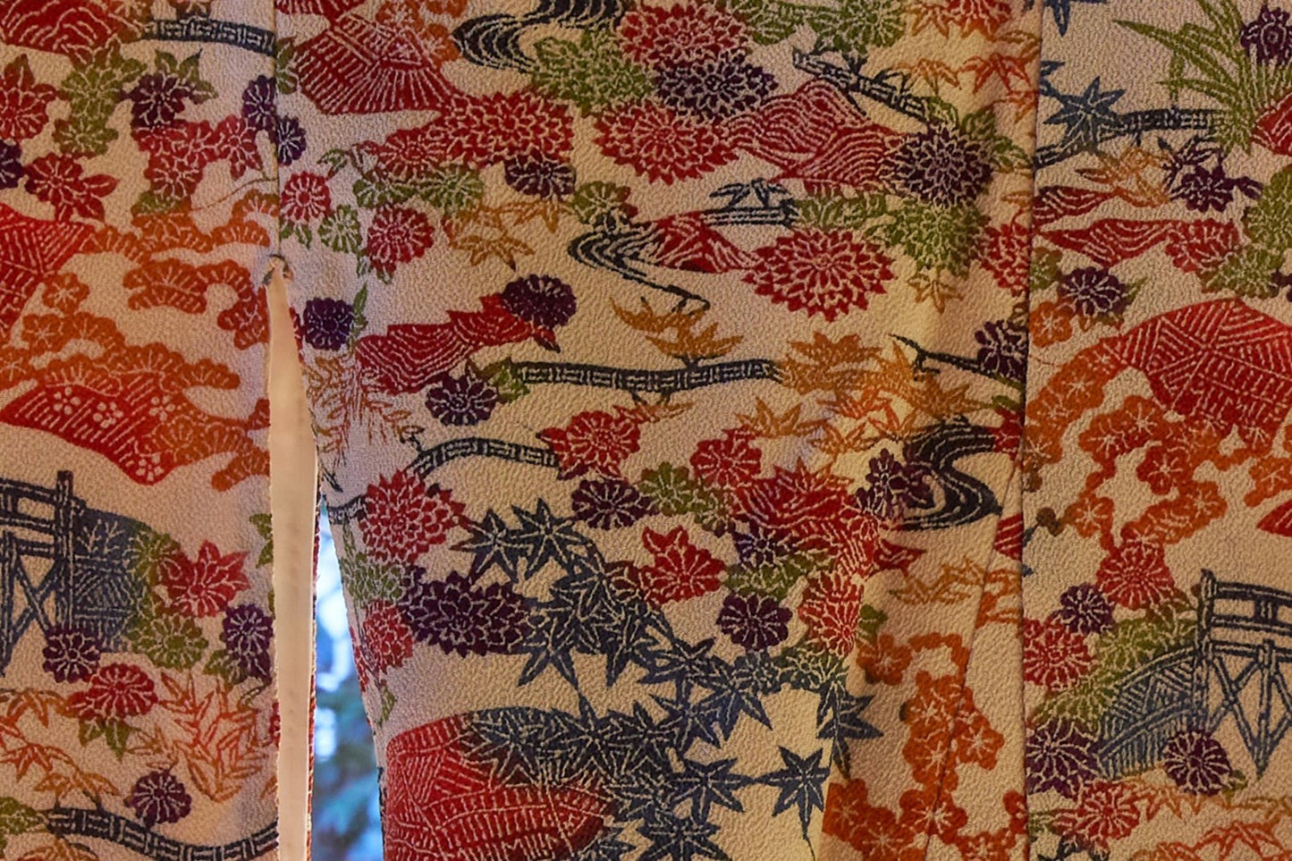Fine silk chirimen crepe kimono with classical floral motifs.  1970s