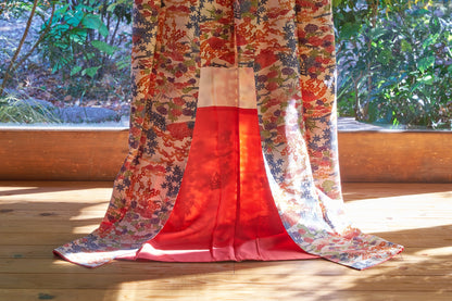 Fine silk chirimen crepe kimono with classical floral motifs.  1970s